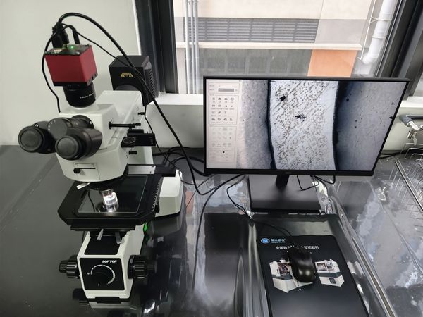 Metallurgical microscope: Sunny Optical MX6R, examining cross-section thickness uniformity, pinholes and coating bonding in black e-coat films