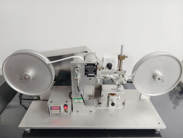 RCA tape abrasion tester: NOMAN TOOL (United States) RCA tape abrasion machine, evaluating surface wear resistance of black e-coat films; a standard acceptance test for consumer-electronics parts
